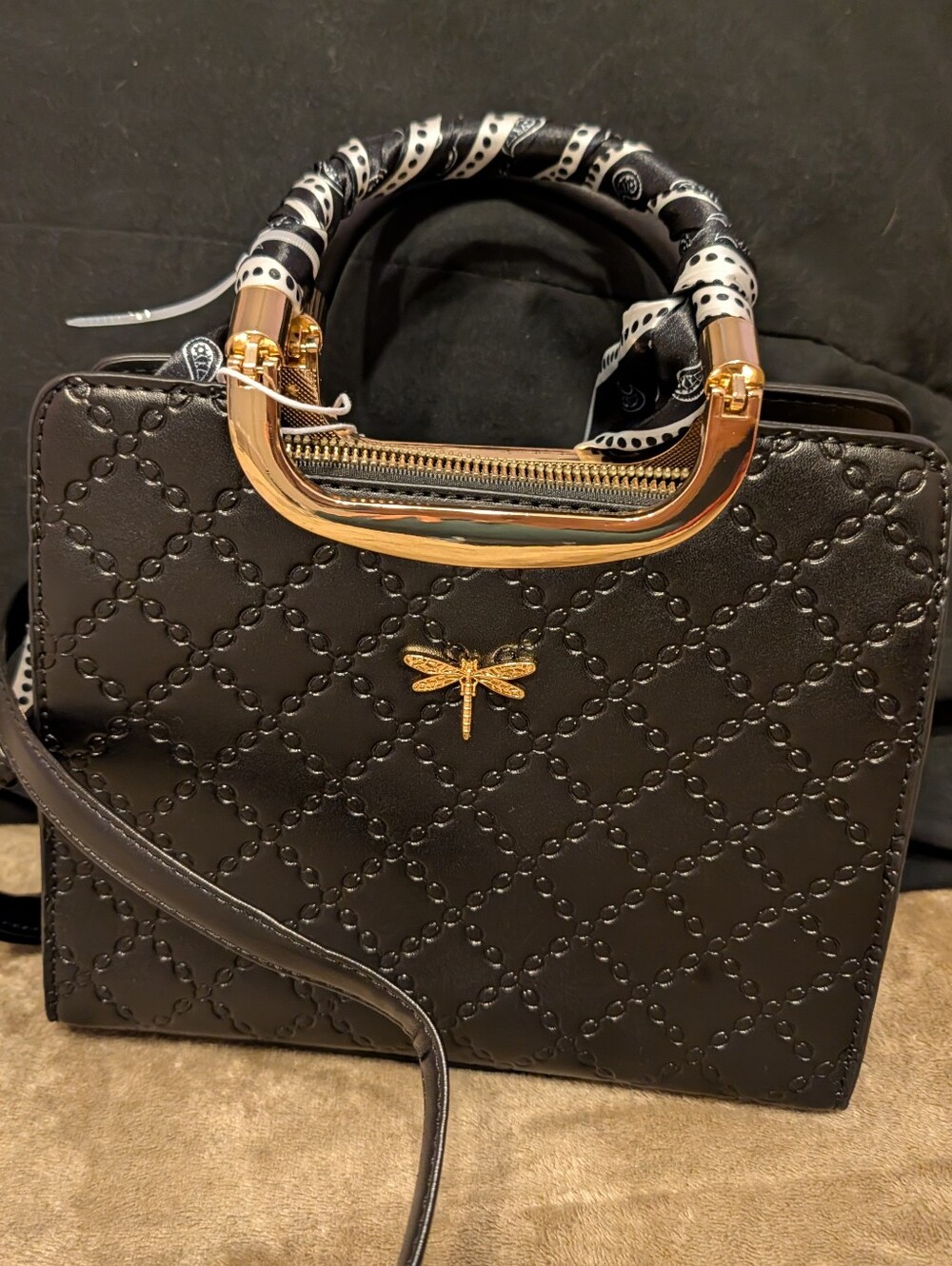 Black Quilted Top-Handle Bag with Gold Dragonfly Accent